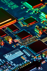 Electronic circuit board with electronic components such as chips close up. The concept of the...