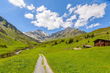 Crossing the Alps. Hiking trail in the Alps. Murren. Switzerland.