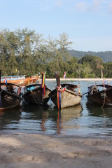 Obraz premium colorful fishing boats on the river