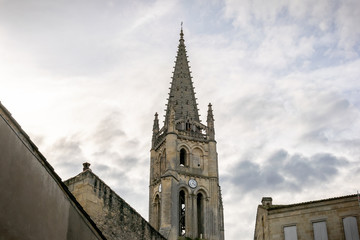 Fototapeta na wymiar Bell tower of the church Monolith de Saint Emilion. Medieval architecture. Aquitaine, France, Europe