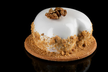 French Artisan Mono Portion Creative Dessert on Black reflective Background. Studio Close Up Photo