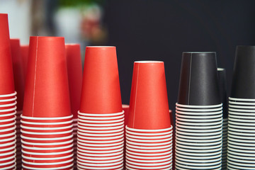 Fototapeta premium red and black paper cups for coffee