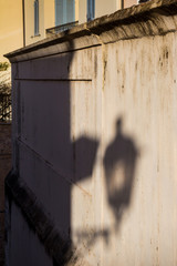 Shadow of a lantern on the facade