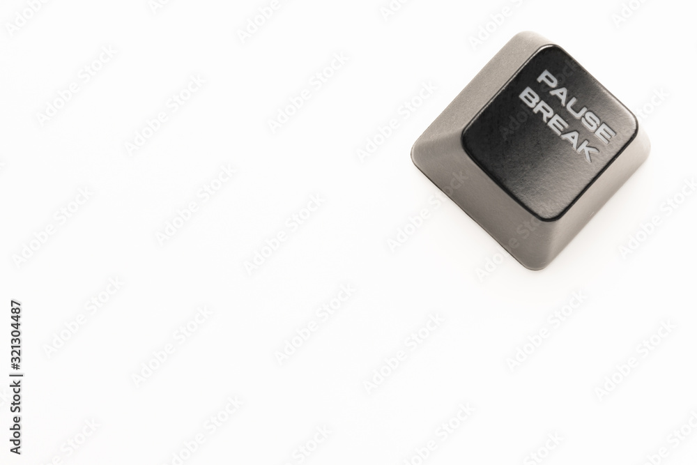 Fototapete black keyboard button with a white inscription pause break in the corner on a white background