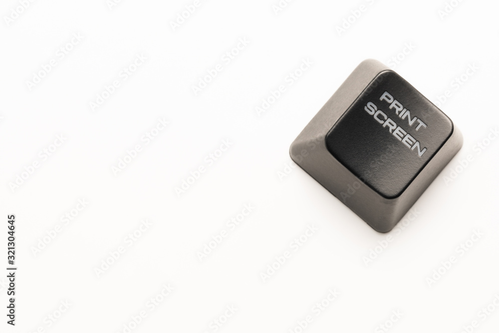 Fototapete black keyboard button with a white inscription print screen in the corner on a white background