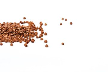 Close up of buckwheat grains isolated on white background