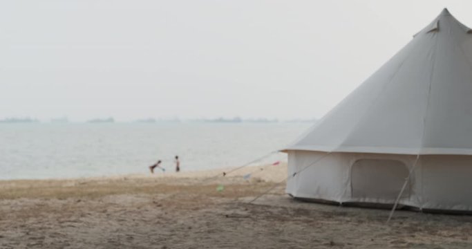 A day at East Coast Park. We see runners, cyclist, couples, childern playing with water on the beach, foreign workers having a BBQ, everyone enjoying their time in their own way 