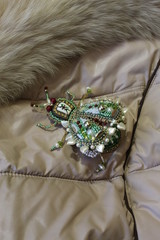 It is fashionable to wear brooches on clothes, on bags - everywhere