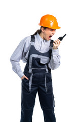 woman civil engineer swears on the walkie-talkie with the workers. Isolated