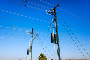 Towers of the electrified catenaries of a high-speed train in Spain.