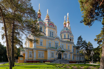 Fototapeta na wymiar Colourful wooden Zenkov (The Ascension) Cathedral in Panfilov Park in Almaty (Alma-Ata), Kazakhstan