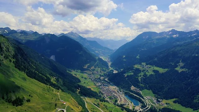 Flying over Val Bedretto and the city of Airolo in the Swiss Alps, Switzerland