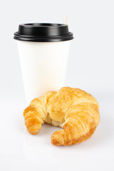 coffee with croissant on a white background
