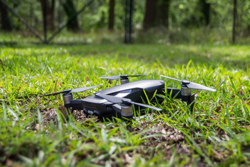 Grounded black remote drone