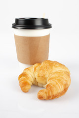coffee with croissant on a white background