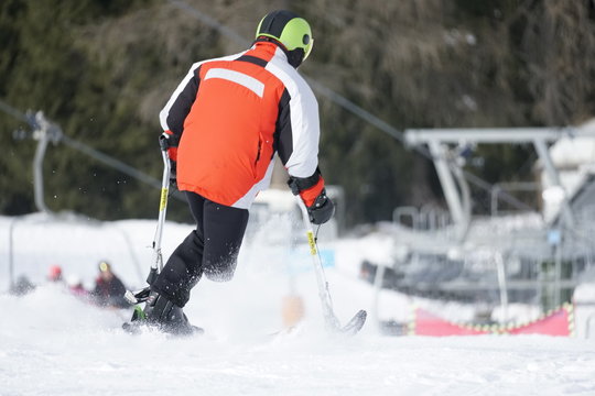 Disabled One Leg Senior Man Downhill Skiing