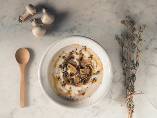White soup, creamy and rustic with mushroom . Autumn warm puree. Vegetarian healthy food. Top view white background. 4