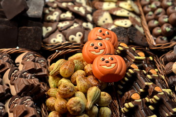 Hallowen pumpkin-shaped chocolate cakes at a Boqueria market stall in Barcelona