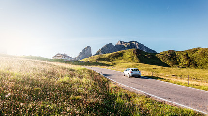Mountain road. beautiful asphalt road in the evening. Incredible summer day. Vintage toning. Highway in mountains. Pass Giau. Dolomites Alps. Italy. popular travel and hiking destination
