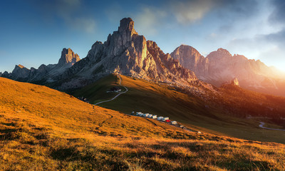 Unsurpassed sunrise in the mountains. Dramatic sunset in dolomites alp mountain from Ra Gusela peak...