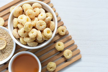 Quinoa cereal, accompanied by seeds and honey
