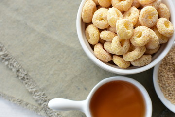 Quinoa cereal, accompanied by seeds and honey