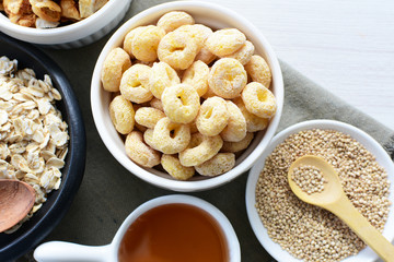 Quinoa cereal, accompanied by seeds and honey
