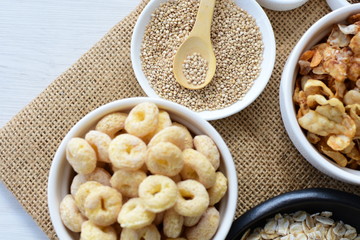 Quinoa cereal, accompanied by seeds and honey