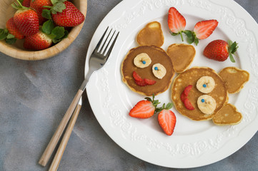 Funny bunny pancakes with fruits