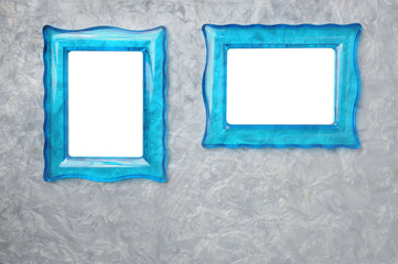 Blue translucent photo frame on marble background