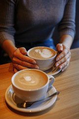 girl with a cup of coffee in a cafe
