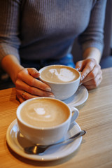 girl with a cup of coffee in a cafe