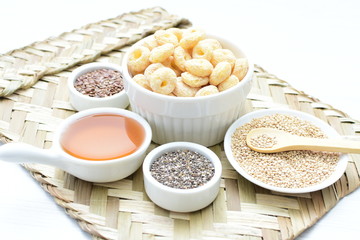 Quinoa cereal, accompanied by seeds and honey