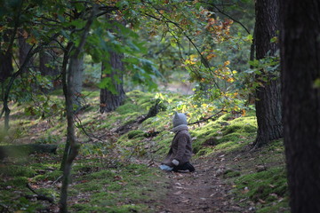 little girl  in the forest