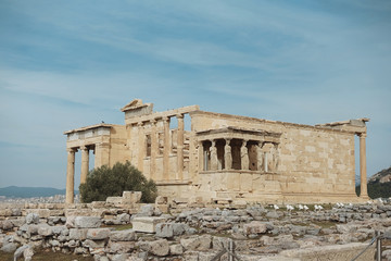 Erechtheion temple with Caryatid Porch on the Acropolis, Athens, Greece. Famous old Acropolis hill...