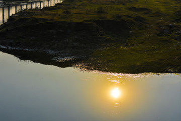 sunset reflection in a river water