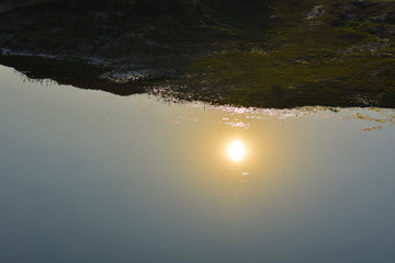 sunset reflection in a river water