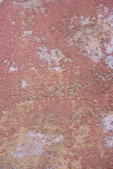 Sienna patterned grungy wall stone background. Top view