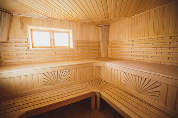 Obraz na płótnie Canvas Sauna of the big size. The light spacious bathroom trimmed with natural wood
