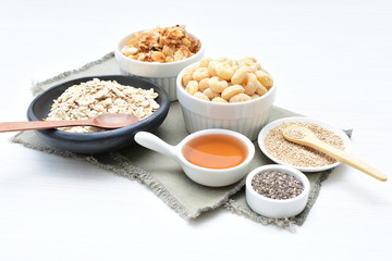 Oatmeal, Quinoa cereal accompanied by seeds and honey