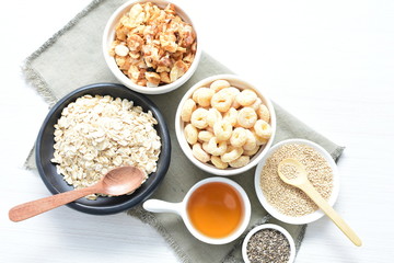 Oatmeal, Quinoa cereal accompanied by seeds and honey