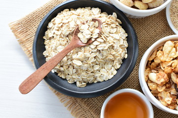 Oatmeal, Quinoa cereal accompanied by seeds and honey