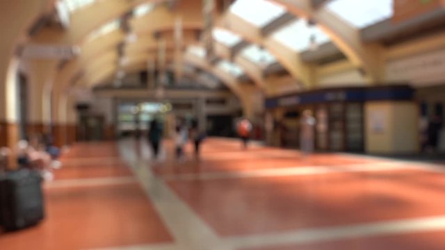Blur image of People passing through Wellington Railway Station, New Zealand