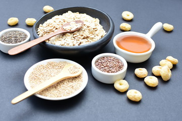 Oatmeal, Quinoa cereal accompanied by seeds and honey