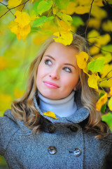 girl with autumn leaves