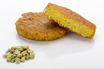 Cooked vegetarian cutlets on lettuce leaves. Fried breaded cutlet isolated on white background. freshly grilled burger vegetarian cutlets. Tasty crispy fried fresh cutlets. Juicy delicious cutlets