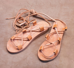 Jesus shoes. Christ sandals. Sandals of Jesus Christ. Jesus sandals on leather underlay. Open type summer footwear. In slovak called "kristusky", in german called "Jesus Sandalen"