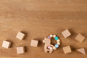Baby kid educational natural eco zero waste wooden toys on wood background