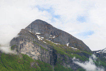 View of Geiranger Fjord one day with overcast sky