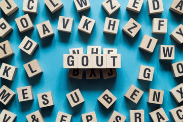 Gout word concept on cubes